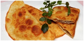 Чебурек, чебуречниця